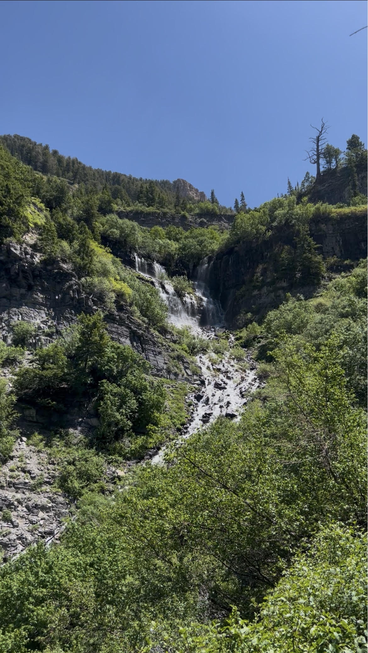 Scout Falls — waterfall cascading down a rocky cliff in Utah